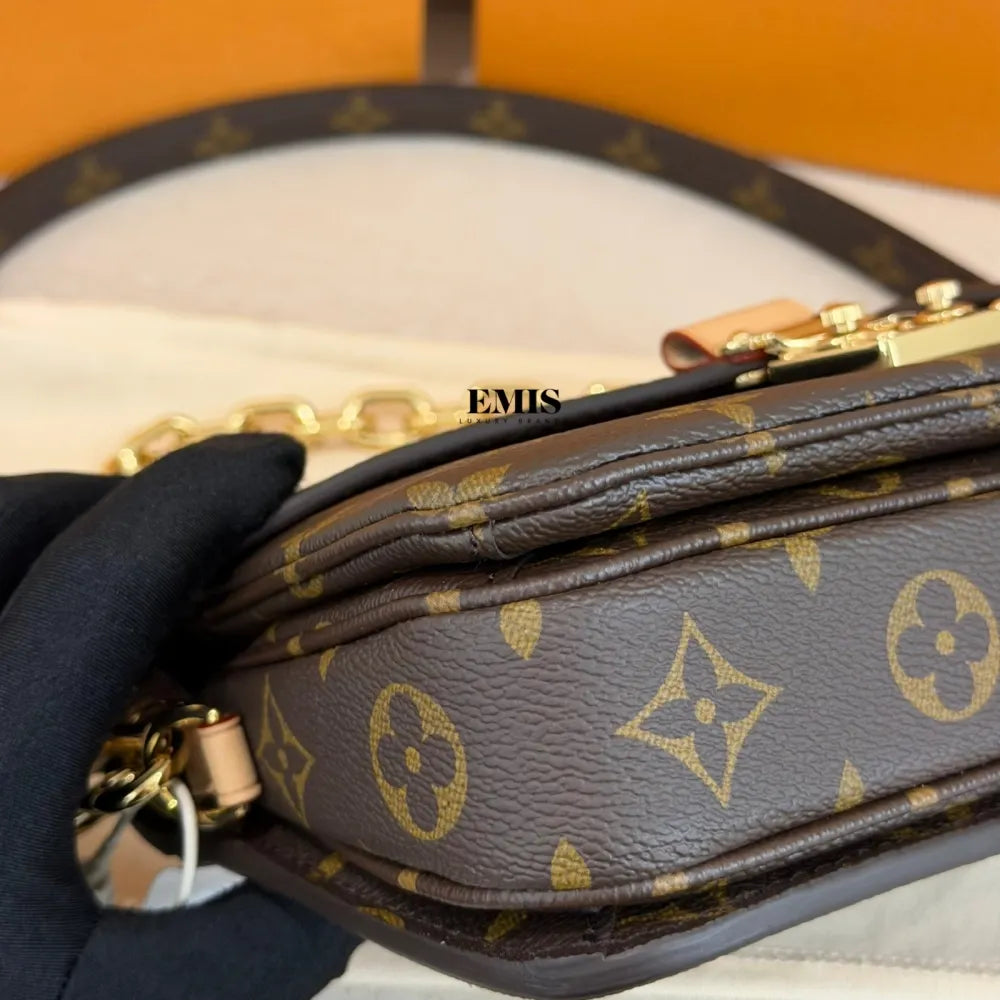 Pochette Métis East West – Bolsa Feminina Monogram de Luxo