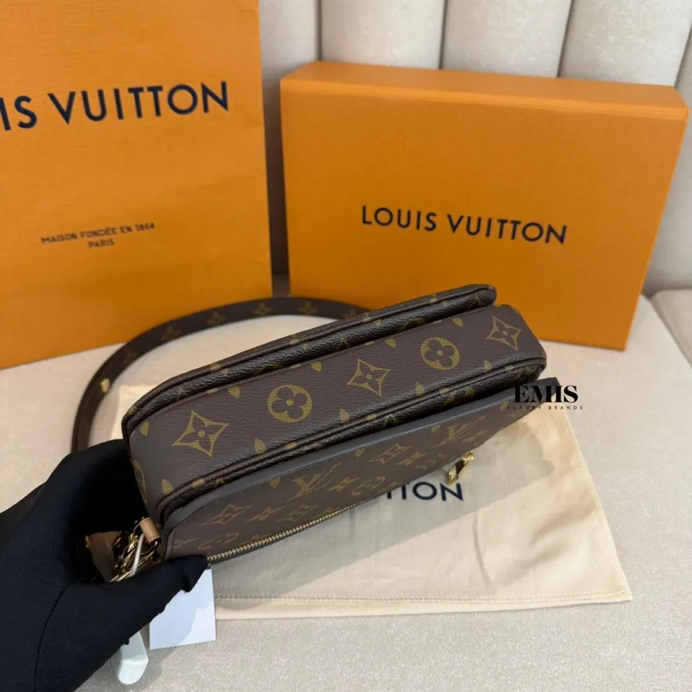Pochette Métis East West – Bolsa Feminina Monogram de Luxo